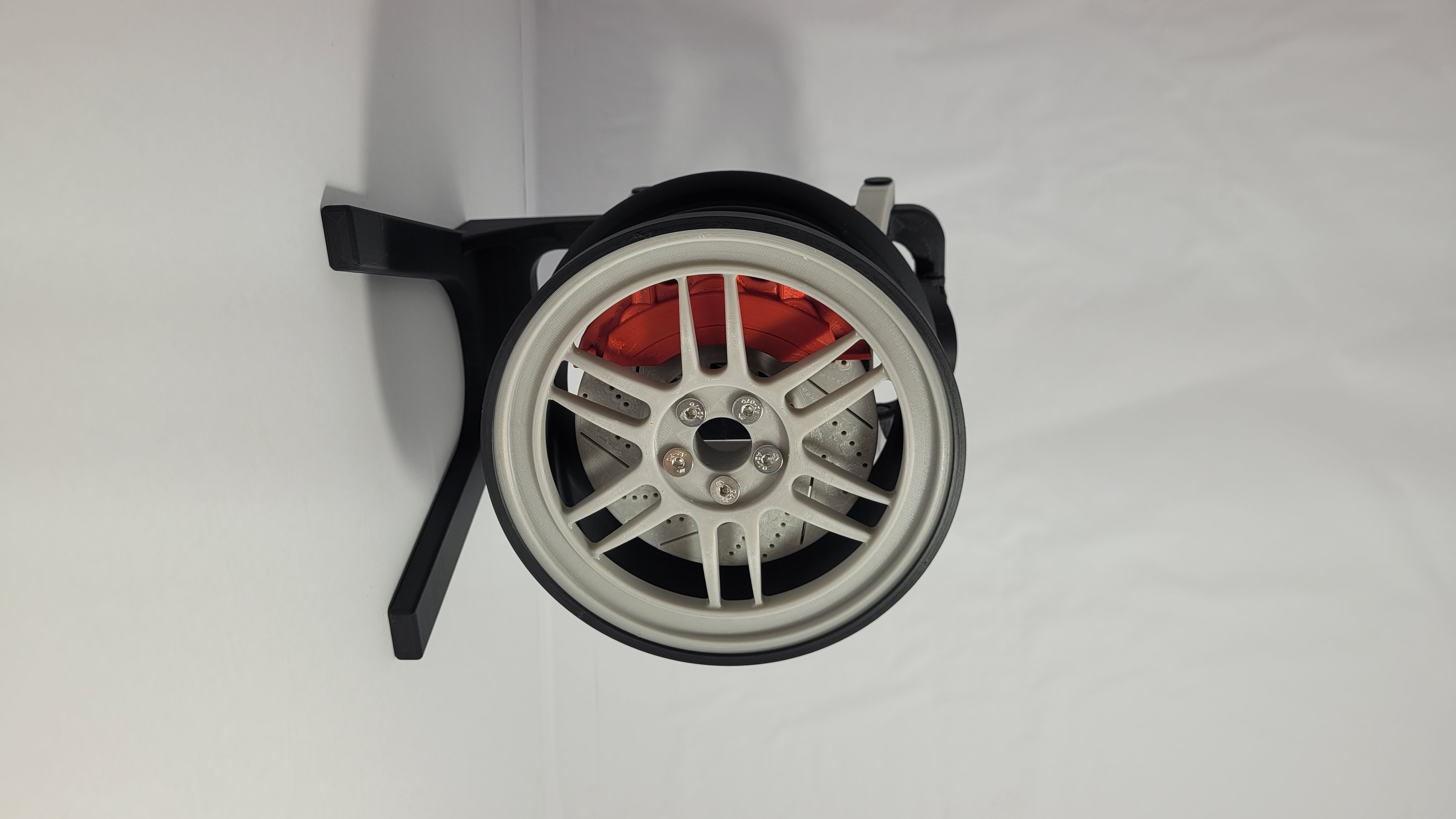Suporte de fone em formato de roda
